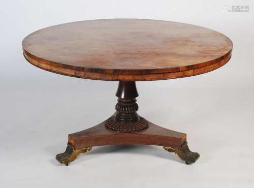 A 19th century rosewood breakfast table, plain round veneere...
