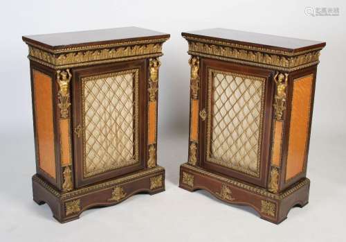 A pair of 19th century French gilt bronze mounted mahogany a...