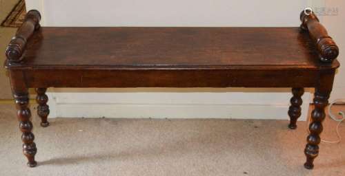 A 19th century stained pine hall bench, the rectangular top ...