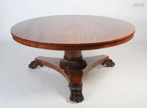 A large 19th century mahogany snap top dining table, the hin...