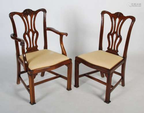 A set of ten early 20th century carved mahogany dining chair...
