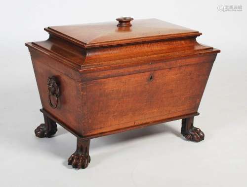 A 19th century mahogany cellarette, of sarcophagus form with...