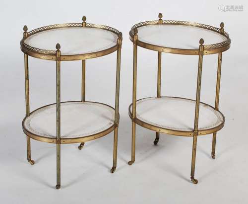 A pair of brass two-tier occasional tables in the manner of ...