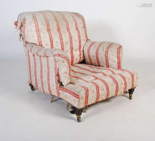 *A late 19th/ early 20th century mahogany armchair by Howard...