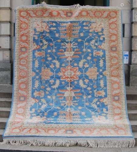 A 20th century Persian carpet, the pale blue field with five...