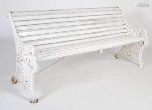 A 19th century cast iron garden bench, the slatted wooden se...