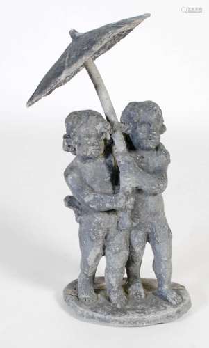 A 20th century lead garden ornament, modelled with two putti...