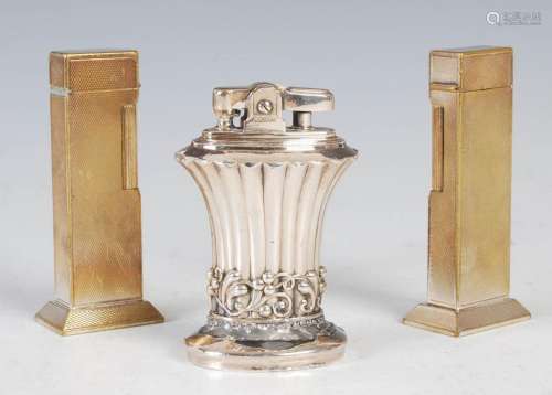 A pair of 20th century Art Deco style table lighters, of rec...