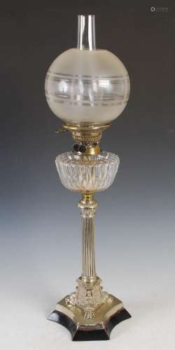 A Victorian electroplated oil lamp, with facet cut clear gla...