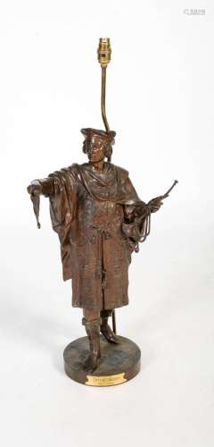 An early 20th century patinated bronze figure of a Herald af...