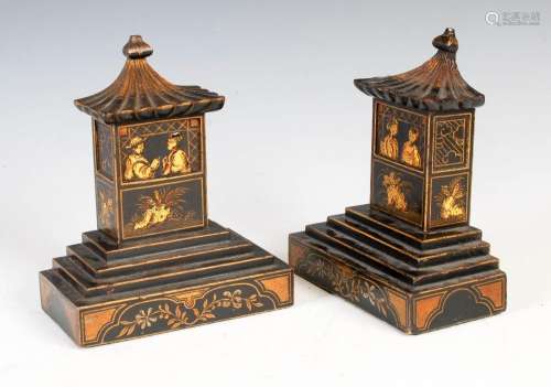 A pair of black lacquer Chinoiserie decorated bookends, mode...