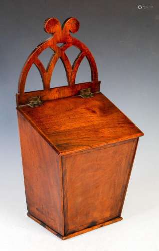 A 19th century wall mounted mahogany candle box, with pieced...