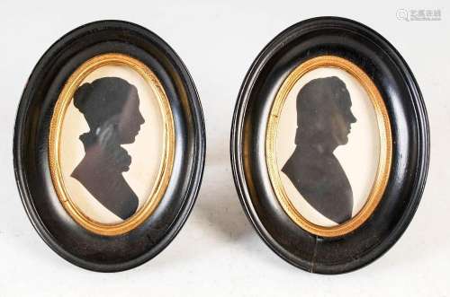 A pair of 19th century silhouette portrait miniatures, in ov...