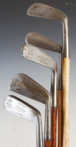 Golf interest- A group of five hickory shafted golf clubs, t...