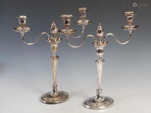 A pair of Sheffield silver plated two-light candelabra in th...