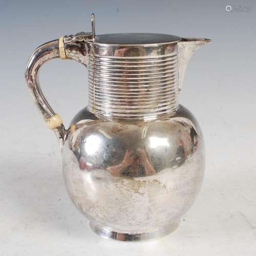 A Victorian Aesthetic Movement silver hot water pot, London,...