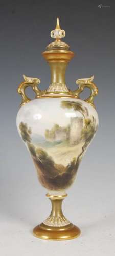 A Royal Worcester twin-handled urn and cover decorated by C....