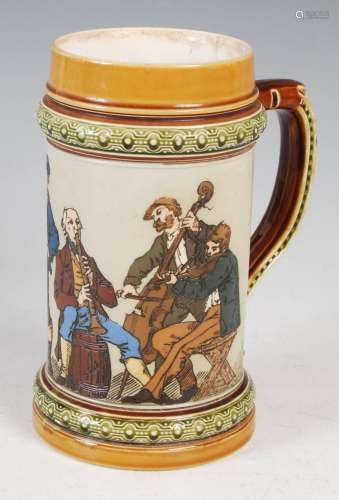 A Mettlach stoneware stein, with incised decoration of music...
