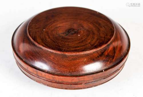 A Chinese dark wood circular box and cover, 9cm diameter x 4...