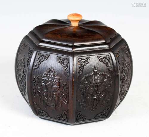 A Chinese dark wood octagonal shaped box and cover, the rect...