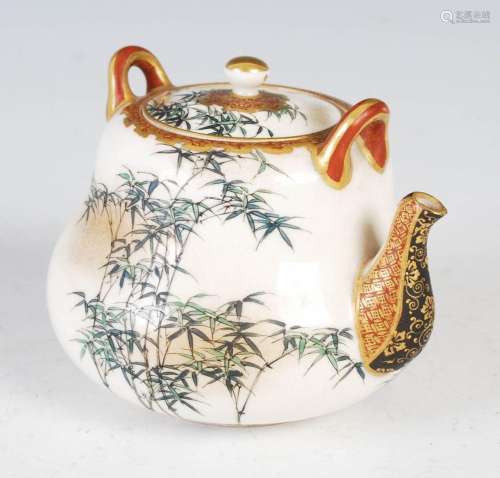 A Japanese Satsuma pottery teapot and cover, late 19th/ earl...