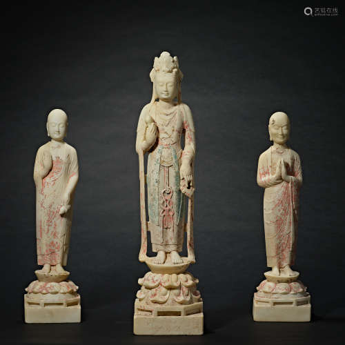 A set of Buddha statues painted on white marble in Chinese T...