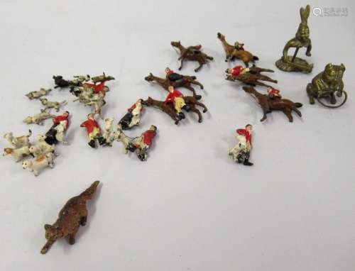 Small quantity of plated lead figures of huntsmen and hounds...