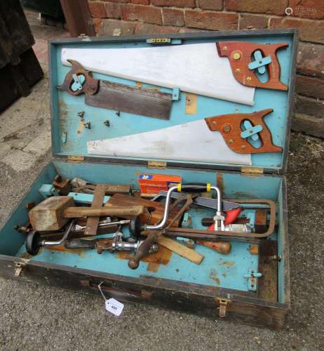 Wooden toolbox of various tools