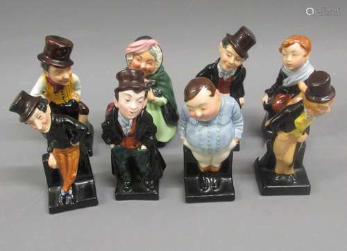 Group of eight small Royal Doulton Dickensian figures