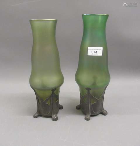 Pair of Art Nouveau iridescent green glass and pewter mounte...