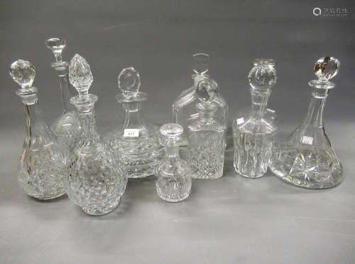 Collection of nine various good quality cut glass decanters,...