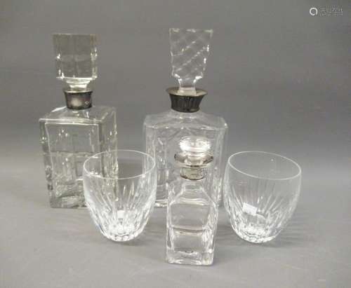 Group of three various silver mounted glass decanters, toget...
