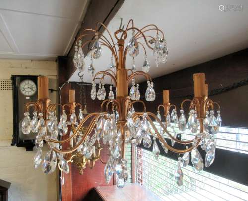 Swarovski crystal and gilt metal eight branch chandelier, 22...