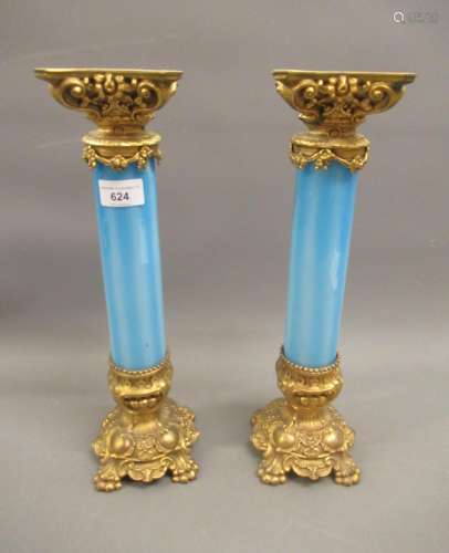 Pair of ormolu and blue vaseline glass candle stands (chip t...