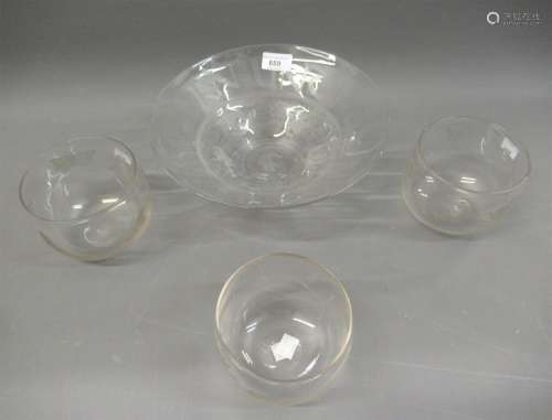 Set of three mid 20th Century glass bowls, etched with cheru...
