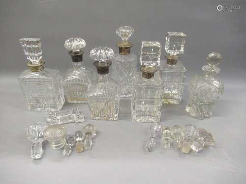 Group of seven various cut glass decanters, (six with silver...