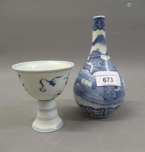 Small Chinese blue and white bottle vase decorated with a la...