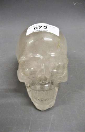 Carved rock crystal model of a skull, 5ins x 3ins approximat...