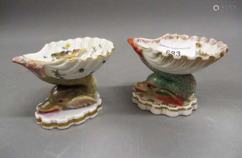 Pair of Berlin porcelain shell pattern pedestal salts, the b...