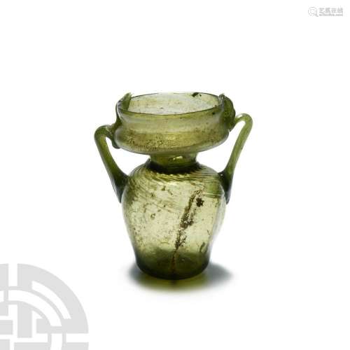Roman Dark Green Glass Jar