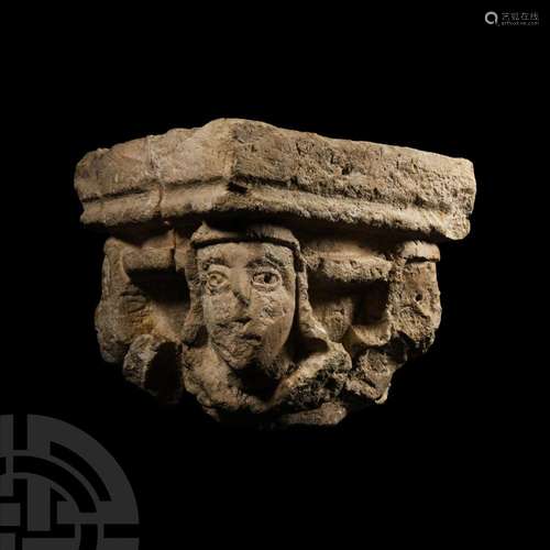 Medieval Stone Capital with Four Faces