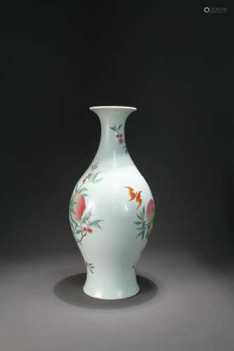 A large chinese vase of fruit