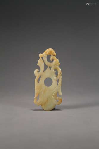 An ancient Chinese yellow hollow dragon pattern jade