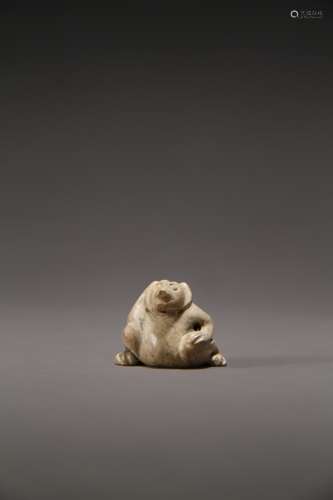 An ancient Chinese bear-shaped jade ornament