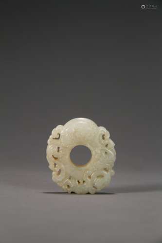 An ancient Chinese white hollow dragon pattern jade