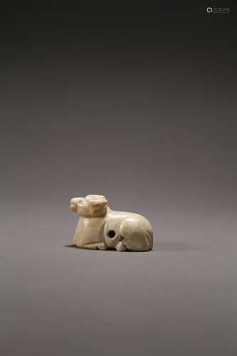 An ancient Chinese ox-shaped jade ornament