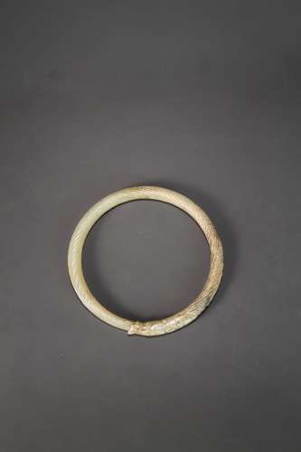 An ancient Chinese white dragon pattern jade bracelet