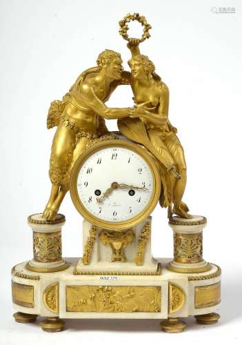 Pendule Louis XVI en marbre blanc et bronze doré au décor de...