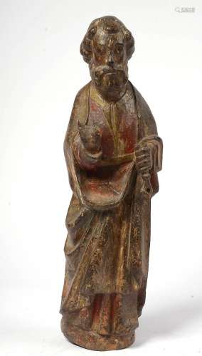 "Saint Pierre" en chêne sculpté portant des traces...