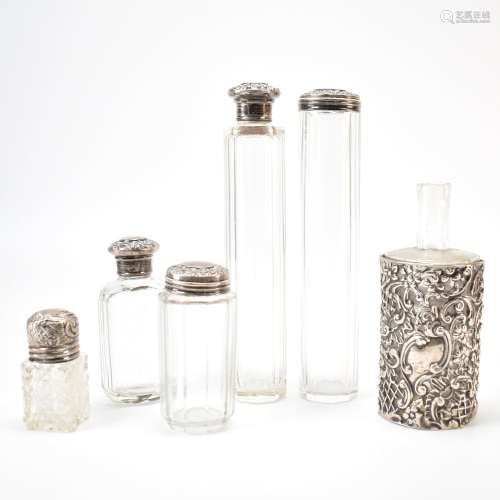 COLLECTION OF ANTIQUE SILVER TOPPED BOTTLES